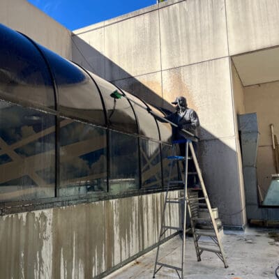 Active Brushing and Washing of Windows at the Convention Center in Chattanooga TN by QualityPRO Power Washing