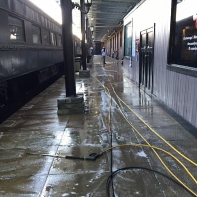 Train Station concrete cleaning in progress! Located in Chattanooga, QualityPRO Power Washing washes the concrete platform during a service agreement or maintenance contract.