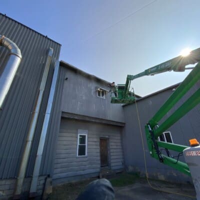 Using a Lyft to Clean a Two Story Industrial Building in Chattanooga TN by QualityPRO Power Washing
