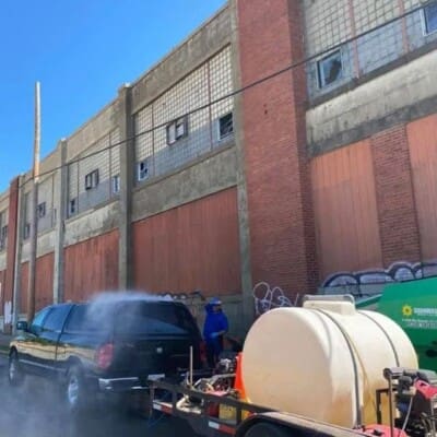 Before Graffiti Removal and Building cleaning at unoccupied industrial building by pressure Washing in Chattanooga TN by QualityPRO Power Washing