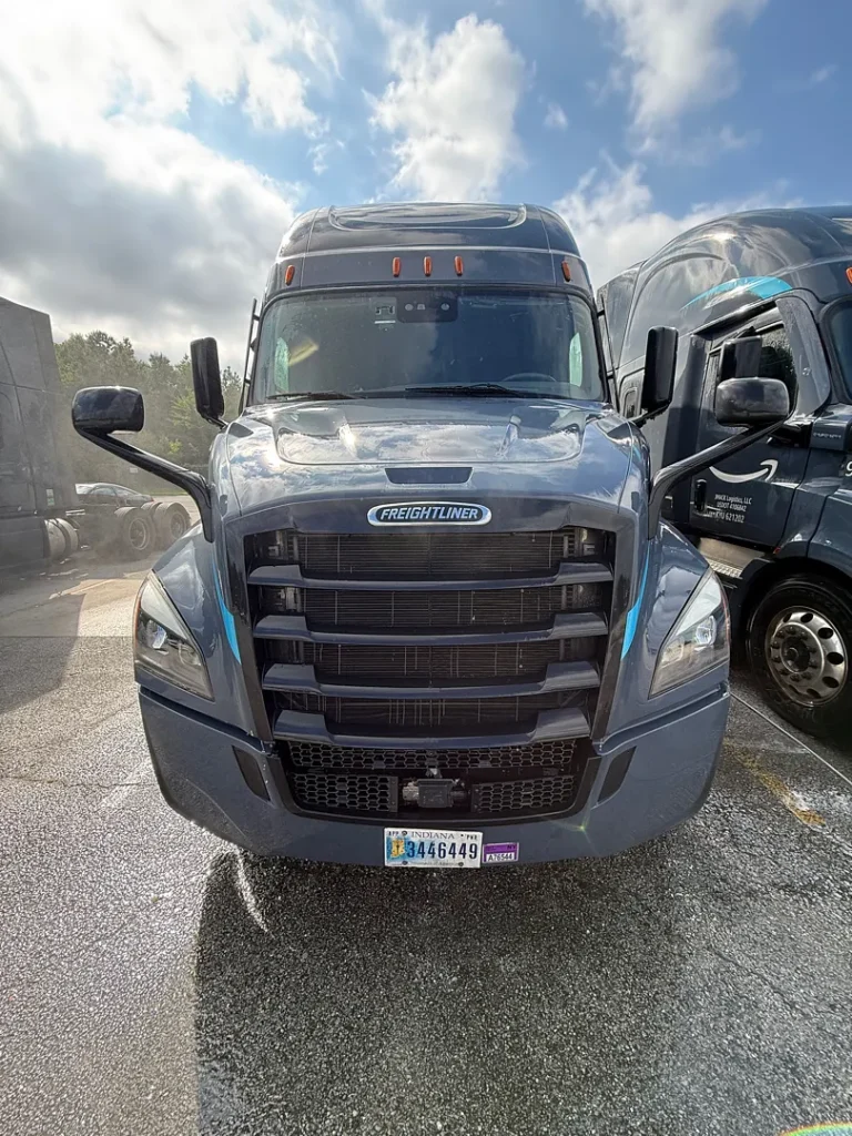 Pressure washing service completed on multiple semi trucks, focusing on the front end and upper cab areas to remove road film, grime, and buildup—leaving a cleaner, brighter finish and a more professional fleet appearance.