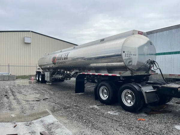 Fleet pressure washing completed on tanker trailers and a service truck, removing heavy road film, grime, and buildup to restore a brighter, cleaner finish and a more professional fleet appearance.
