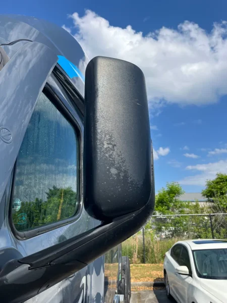 Pressure washing service completed on multiple semi trucks, focusing on the front end and upper cab areas to remove road film, grime, and buildup—leaving a cleaner, brighter finish and a more professional fleet appearance.