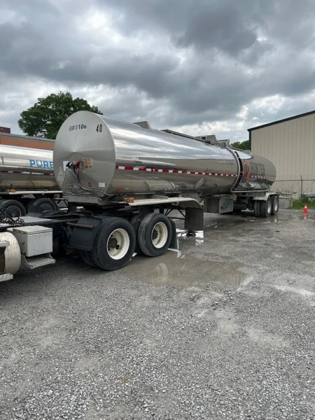 Fleet pressure washing completed on tanker trailers and a service truck, removing heavy road film, grime, and buildup to restore a brighter, cleaner finish and a more professional fleet appearance.
