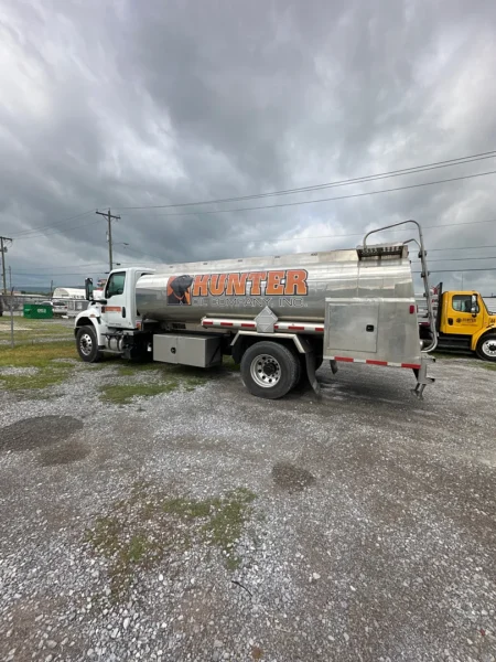 Fleet pressure washing completed on tanker trailers and a service truck, removing heavy road film, grime, and buildup to restore a brighter, cleaner finish and a more professional fleet appearance.