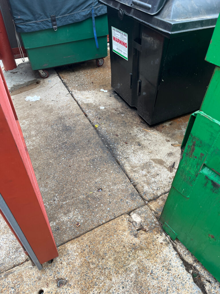 This commercial pressure washing project restored the safety and appearance of high-traffic concrete surfaces in Chattanooga by using specialized detergents and surface cleaners to remove organic growth, grime, and heavy soiling from the main patio, entrance, and service areas.