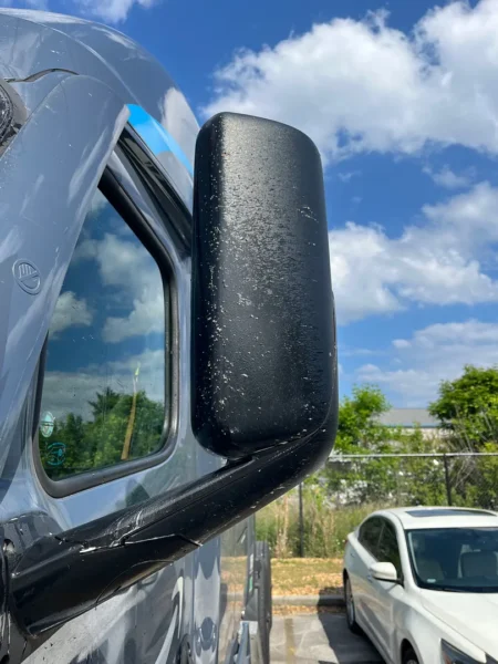 Pressure washing service completed on multiple semi trucks, focusing on the front end and upper cab areas to remove road film, grime, and buildup—leaving a cleaner, brighter finish and a more professional fleet appearance.