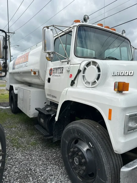 Fleet pressure washing completed on tanker trailers and a service truck, removing heavy road film, grime, and buildup to restore a brighter, cleaner finish and a more professional fleet appearance.