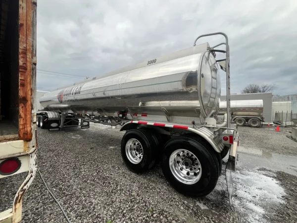 Fleet pressure washing completed on tanker trailers and a service truck, removing heavy road film, grime, and buildup to restore a brighter, cleaner finish and a more professional fleet appearance.