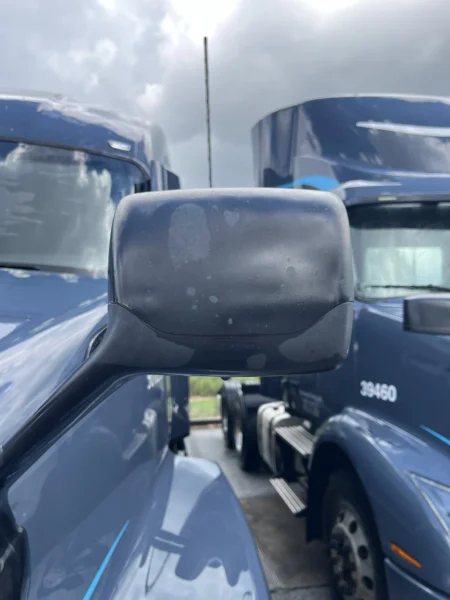 Pressure washing service completed on multiple semi trucks, focusing on the front end and upper cab areas to remove road film, grime, and buildup—leaving a cleaner, brighter finish and a more professional fleet appearance.