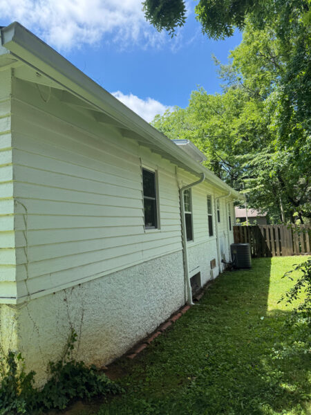 This project involved a comprehensive soft wash of the home's various siding materials and a wood deck to remove organic growth and surface contaminants while preserving the integrity of all finishes.