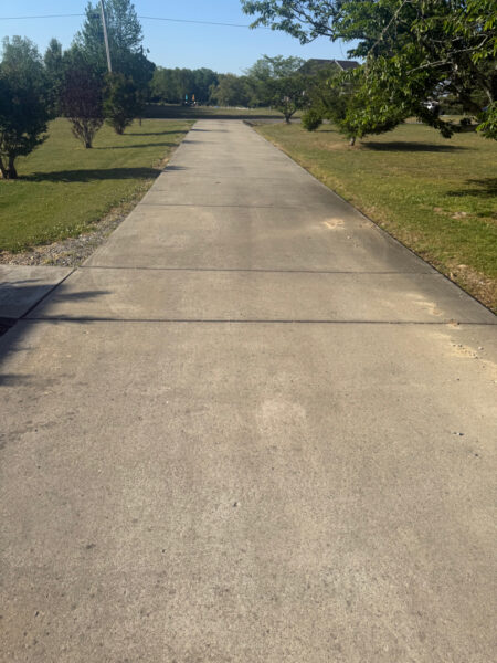 This project in Ider featured a comprehensive soft wash of the residence and garage along with a restorative surface treatment of the driveway and walkways to remove organic growth and prepare exterior wood surfaces for painting.
