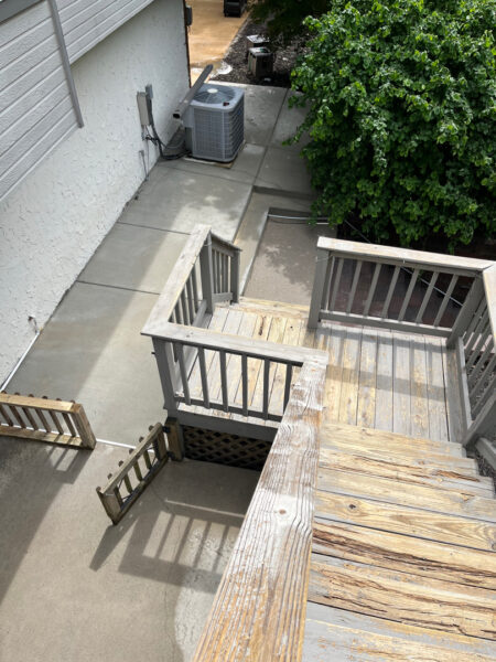 This comprehensive exterior cleaning project involved a full soft wash of the home's surfaces, a dedicated pressure wash of concrete hardscapes and retaining walls, and a gentle cleaning of the wood deck and mailbox to remove organic growth and restore the property's appearance.