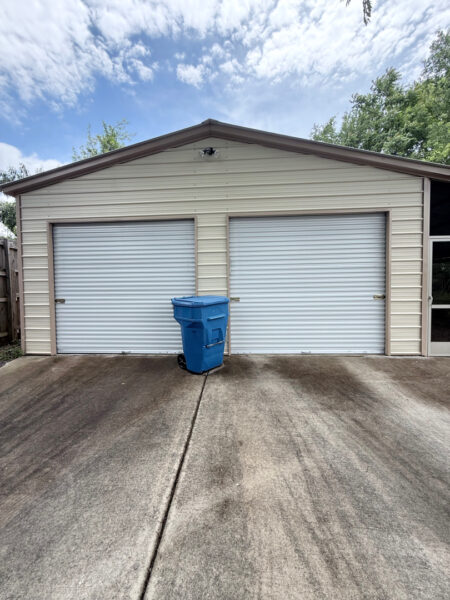 This project involved a comprehensive soft wash cleaning of a one-story residence, metal garage, and wood deck in Chattanooga to remove organic growth and dirt while preserving the integrity of all exterior surfaces.