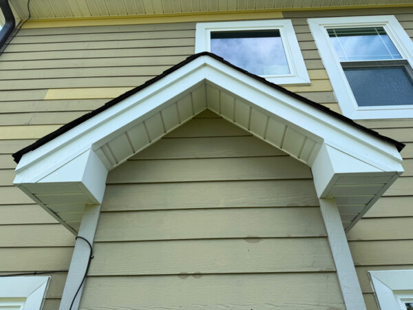 This project involved a comprehensive soft wash of a two-story residence in Ringgold to remove organic buildup from all exterior surfaces and prepare the screened porch for painting.