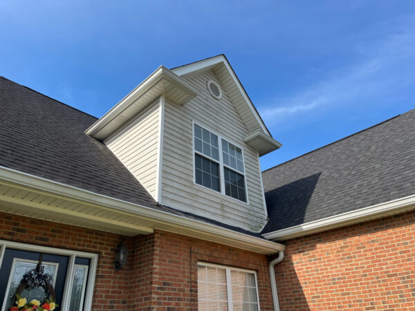 This project involved a comprehensive soft-wash cleaning of a two-story residence in Ringgold, using a low-pressure detergent blend and gentle hand agitation to safely remove organic growth and debris from all exterior siding, trim, gutters, and downspouts.