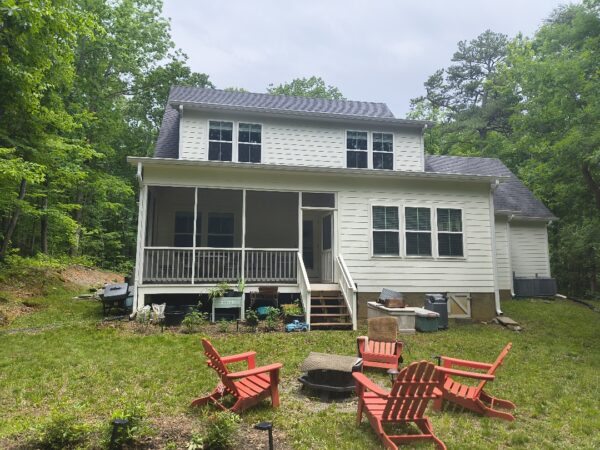 This project involved a comprehensive low-pressure soft wash of a two-story residence to remove organic growth and debris from various exterior surfaces, including brick, vinyl, and Hardie board, while protecting delicate fixtures and landscaping.
