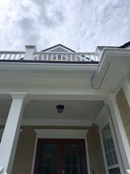 The team performed a targeted soft-wash of the front porches, vertical surfaces, and brick steps of a one-story residence in Chattanooga, complemented by a professional surface cleaning of the driveway, sidewalk, and walkways to enhance curb appeal.
