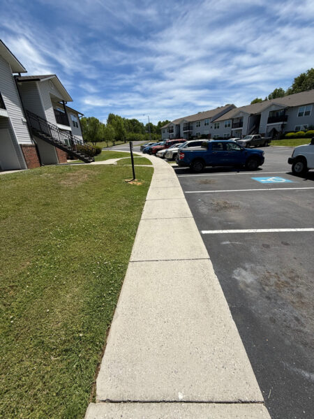 This project involved a comprehensive exterior soft wash and pressure cleaning of an apartment community in Cleveland, restoring the buildings, breezeways, concrete walkways, mail center, dumpster pads, and clubhouse to a clean and refreshed condition.