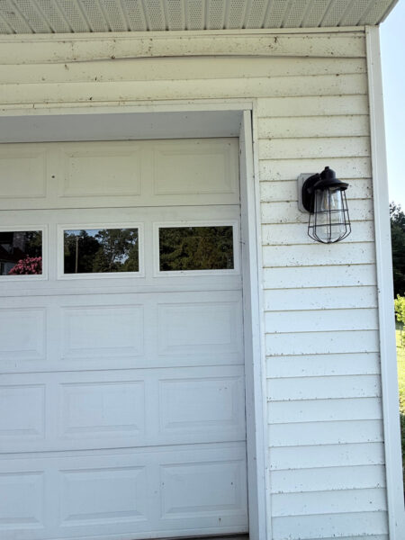 The contractor performed a comprehensive exterior cleaning in Chickamauga, utilizing soft washing for the home and workshop siding and professional surface cleaning for all concrete driveways, walkways, and patios.