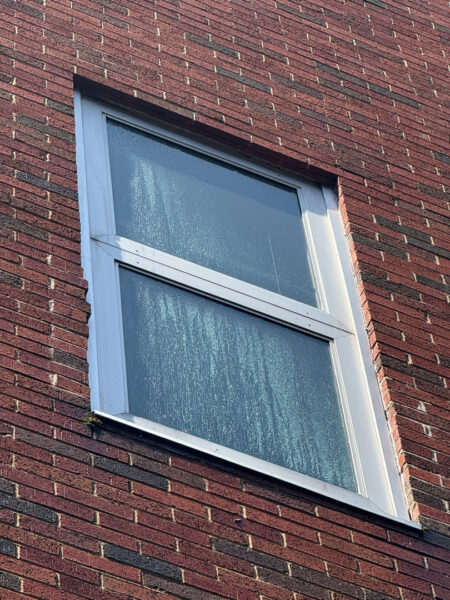 This project encompassed an exterior refresh of a Chattanooga commercial property through power washing structural surfaces, repainting pedestrian bridge handrails, pressure washing concrete areas, and hand-cleaning second-story windows.