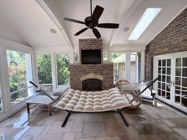 This project involved a comprehensive exterior refresh of a Chattanooga home using soft washing and surface cleaning to safely remove dirt, mold, and residue from the siding, gutters, porches, concrete walkways, brick retaining walls, entryway columns, wooden swing, and stone pool deck.