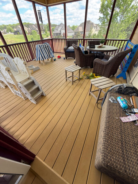 This comprehensive exterior restoration in Soddy-Daisy utilized professional soft-wash and pressure washing techniques to clean the home's siding, concrete surfaces, pool deck, three wood decks, patio furniture, retaining walls, and both interior and exterior windows.
