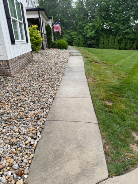 This project involved a complete exterior cleaning of a Chattanooga property, utilizing a gentle soft wash on the home's various siding materials and a pressure wash on surrounding concrete surfaces to remove dirt, mold, and stains.