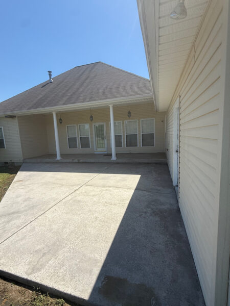 This project in Ider featured a comprehensive soft wash of the residence and garage along with a restorative surface treatment of the driveway and walkways to remove organic growth and prepare exterior wood surfaces for painting.