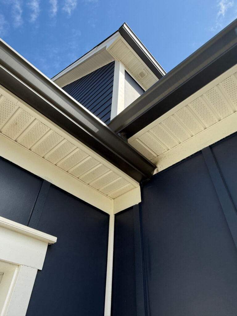 A two-story home in Cleveland, TN, received a comprehensive soft wash cleaning of its vertical surfaces, gutters, and trim, backed by a one-year warranty against mold and mildew regrowth.