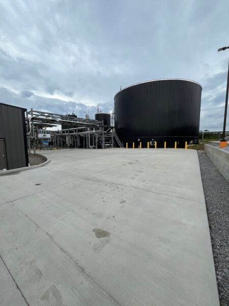 Professional surface washing and detergent treatment were performed on the concrete entrance and exit pads of a commercial scale in Chattanooga to remove organic buildup while strictly adhering to site-specific exclusion zones.