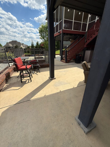 This comprehensive exterior restoration in Soddy-Daisy utilized professional soft-wash and pressure washing techniques to clean the home's siding, concrete surfaces, pool deck, three wood decks, patio furniture, retaining walls, and both interior and exterior windows.