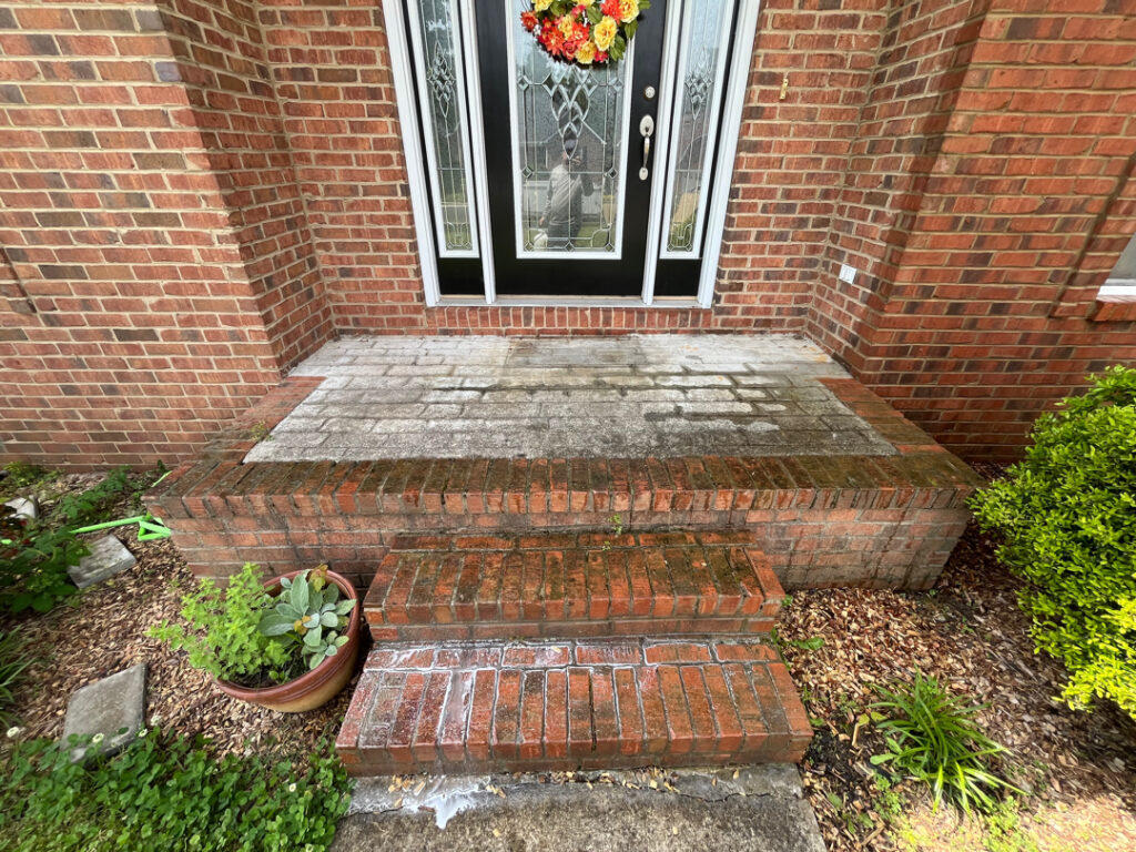 This project involved a comprehensive soft-wash cleaning of a two-story residence in Ringgold, using a low-pressure detergent blend and gentle hand agitation to safely remove organic growth and debris from all exterior siding, trim, gutters, and downspouts.