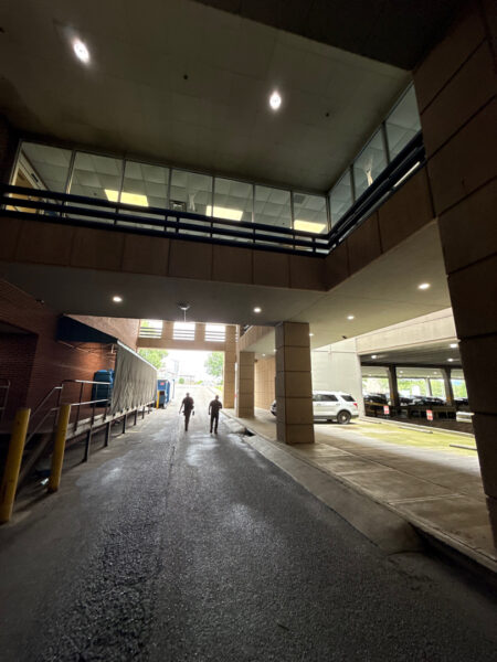 This project encompassed an exterior refresh of a Chattanooga commercial property through power washing structural surfaces, repainting pedestrian bridge handrails, pressure washing concrete areas, and hand-cleaning second-story windows.