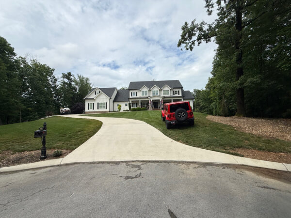 This project involved a complete exterior cleaning of a Chattanooga property, utilizing a gentle soft wash on the home's various siding materials and a pressure wash on surrounding concrete surfaces to remove dirt, mold, and stains.