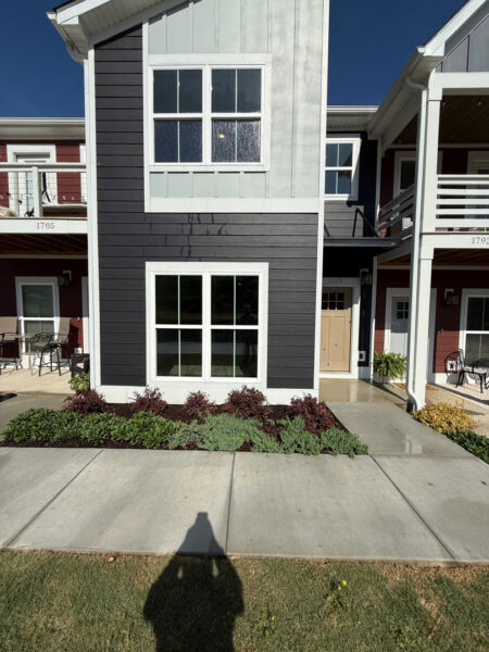 This project involved a comprehensive exterior rinse of a newly constructed Chattanooga home, detached garage, and surrounding hardscapes, including the walkway, driveway, and patio, to remove post-construction dust, debris, and residue in preparation for the final walkthrough and move-in.