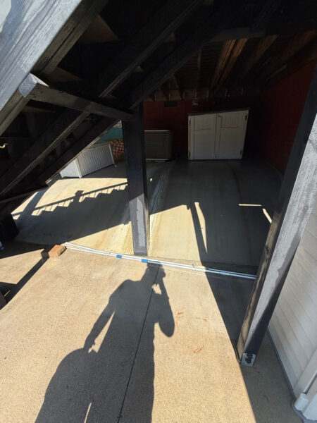 This project involved a comprehensive exterior cleaning of a Cleveland outdoor living space, utilizing specialized detergents and soft-wash techniques to remove pet hair, organic growth, and grime from a concrete pool deck and a multi-level wood deck.