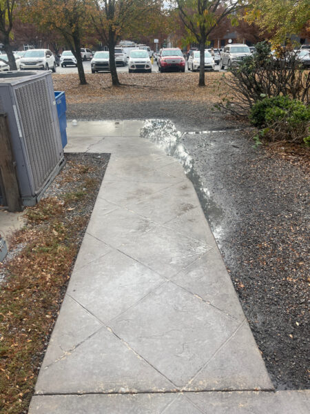 The project at Urban Stack in Chattanooga involved inspecting and thoroughly pressure washing the restaurant's exterior sidewalks, dining patios, and side entrance to remove dirt, stains, and grease, thereby restoring a clean appearance and improving pedestrian safety.