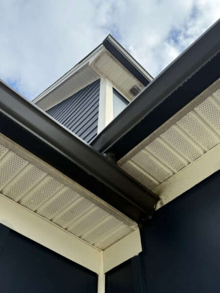 A two-story home in Cleveland, TN, received a comprehensive soft wash cleaning of its vertical surfaces, gutters, and trim, backed by a one-year warranty against mold and mildew regrowth.