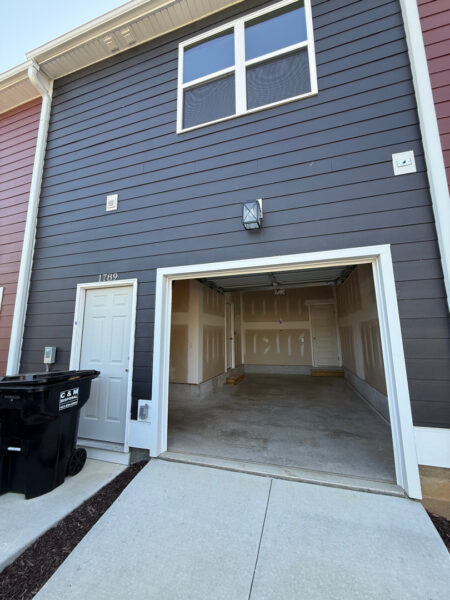 This project involved a comprehensive exterior rinse of a newly constructed Chattanooga home, detached garage, and surrounding hardscapes, including the walkway, driveway, and patio, to remove post-construction dust, debris, and residue in preparation for the final walkthrough and move-in.