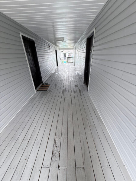 This project involved a comprehensive exterior soft wash and pressure cleaning of an apartment community in Cleveland, restoring the buildings, breezeways, concrete walkways, mail center, dumpster pads, and clubhouse to a clean and refreshed condition.