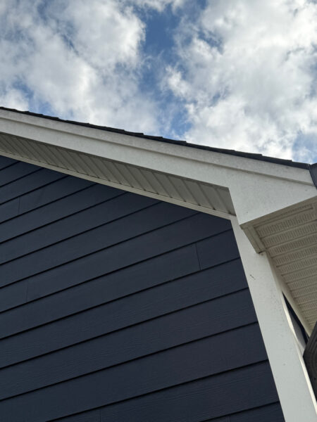 A two-story home in Cleveland, TN, received a comprehensive soft wash cleaning of its vertical surfaces, gutters, and trim, backed by a one-year warranty against mold and mildew regrowth.