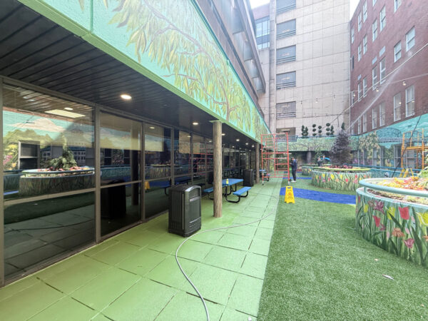 This project encompassed an exterior refresh of a Chattanooga commercial property through power washing structural surfaces, repainting pedestrian bridge handrails, pressure washing concrete areas, and hand-cleaning second-story windows.