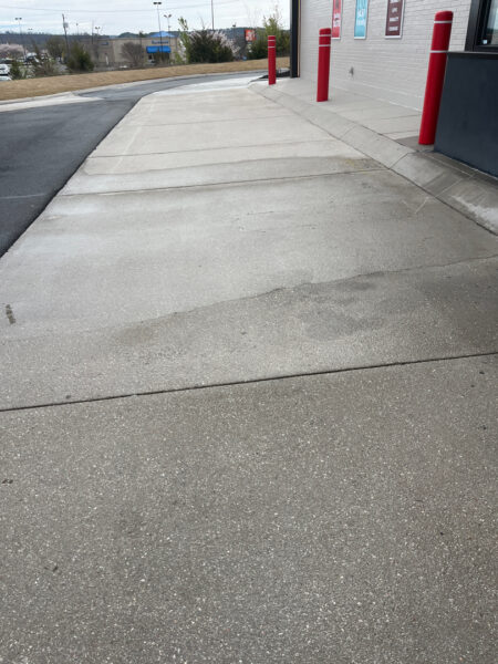 This commercial cleaning project in Fort Oglethorpe restored the property's exterior appeal by thoroughly washing the building, delicate awnings, concrete drive-thru lanes, dumpster area, and parking pads.