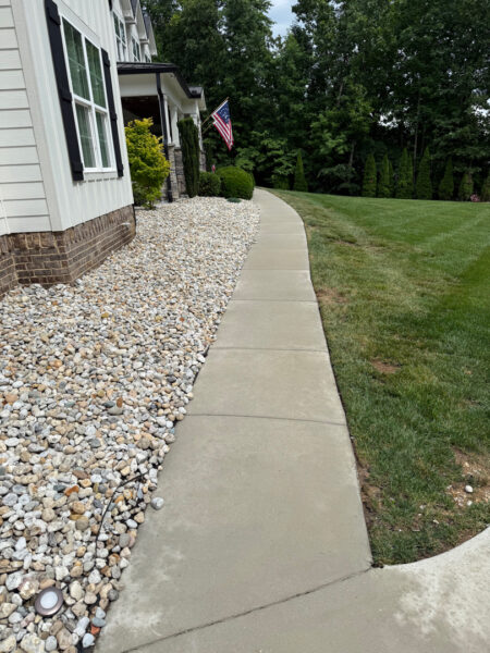 This project involved a complete exterior cleaning of a Chattanooga property, utilizing a gentle soft wash on the home's various siding materials and a pressure wash on surrounding concrete surfaces to remove dirt, mold, and stains.