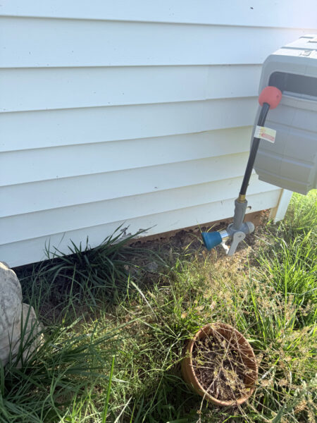 The contractor performed a comprehensive exterior cleaning in Chickamauga, utilizing soft washing for the home and workshop siding and professional surface cleaning for all concrete driveways, walkways, and patios.