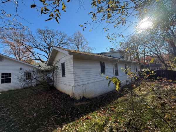 This project involved a comprehensive soft wash of the home's various siding materials and a wood deck to remove organic growth and surface contaminants while preserving the integrity of all finishes.