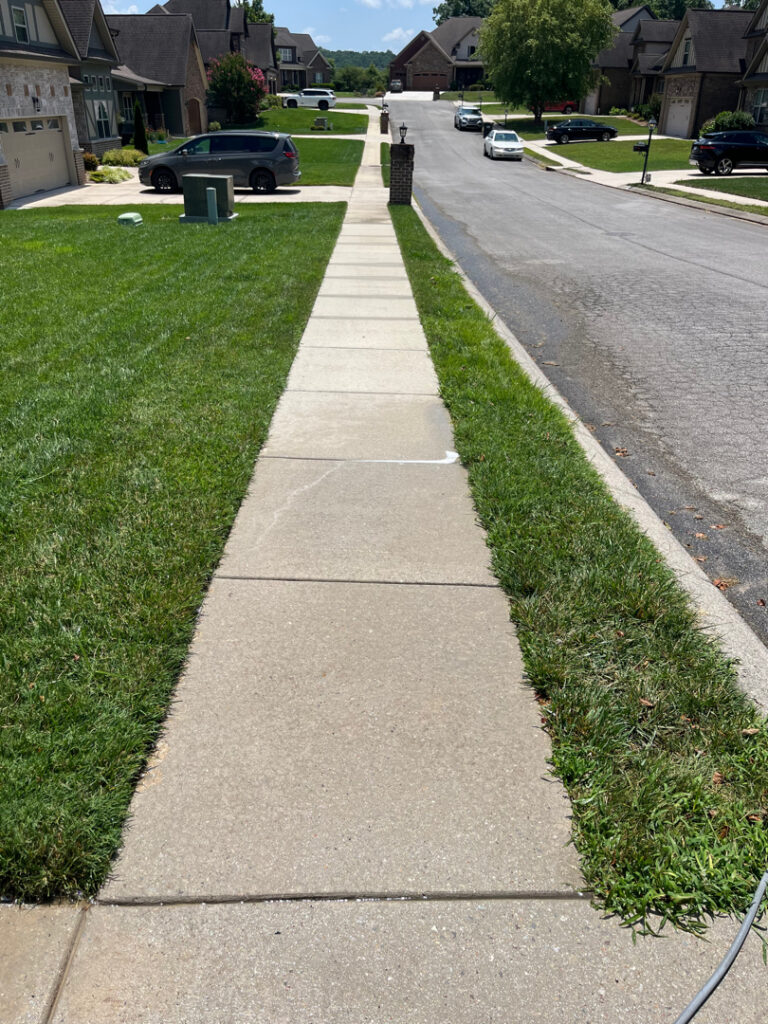 This project involved a comprehensive exterior concrete cleaning of a driveway, front walkway, and sidewalk in Apison using specialized detergents, surface washing equipment, and a thorough rinse to remove mold, mildew, and grime.