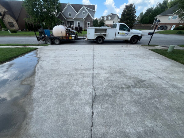 This project involved a comprehensive exterior concrete cleaning of a driveway, front walkway, and sidewalk in Apison using specialized detergents, surface washing equipment, and a thorough rinse to remove mold, mildew, and grime.