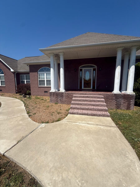 This project in Ider featured a comprehensive soft wash of the residence and garage along with a restorative surface treatment of the driveway and walkways to remove organic growth and prepare exterior wood surfaces for painting.